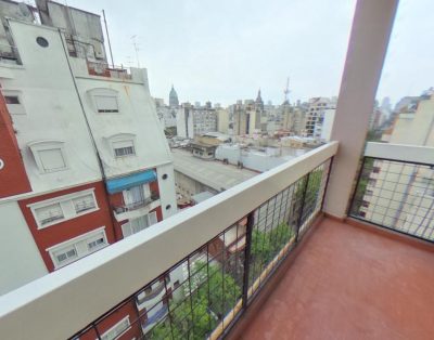 Departamento con un Dormitorio, 2 Balcones. Piso Alto Luz Natural Todo El Día.